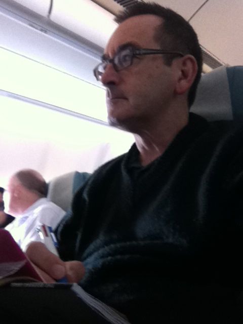 business traveller on plane